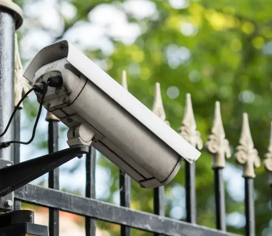 Outdoor home security camera on a gated property in Dallas