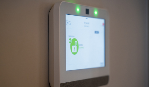 Wall-mounted commercial alarm system control panel