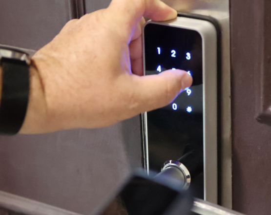 Entering a code on a commercial access control keypad in Dallas