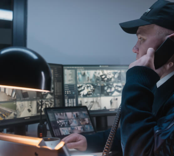 Central station operator handling an Irving business alarm