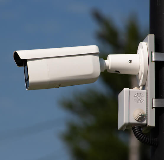 Security camera integrated with an Irving alarm and access system